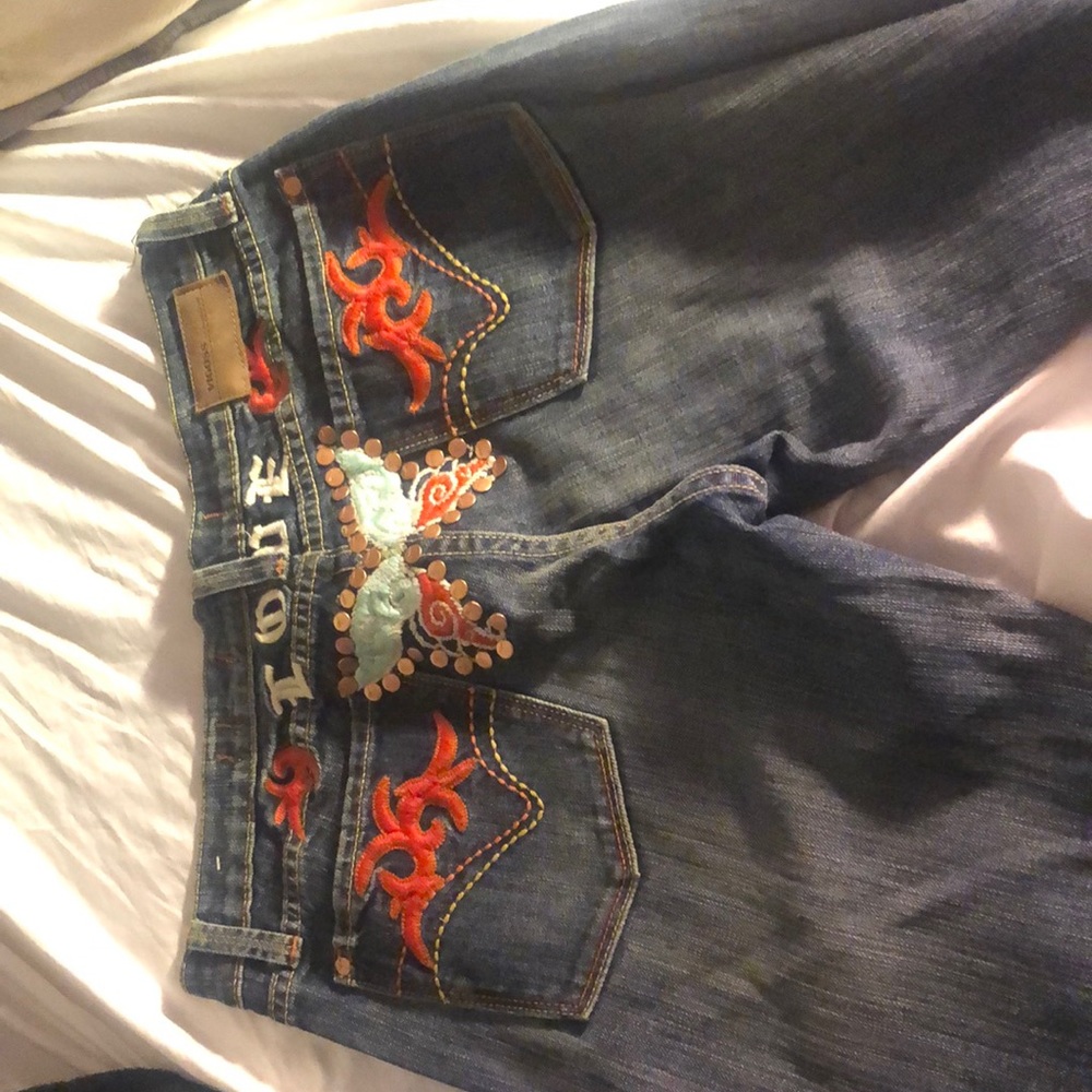 cute butterfly flare jeans!